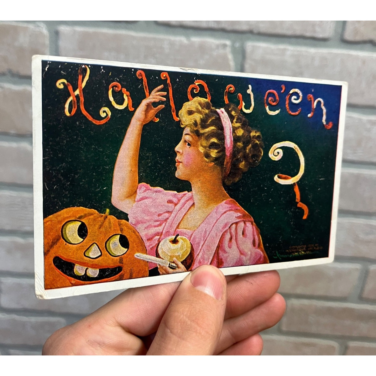 HALLOWEEN Girl Peels Apple Jack-O-Lantern International 1908 embossed Postcard