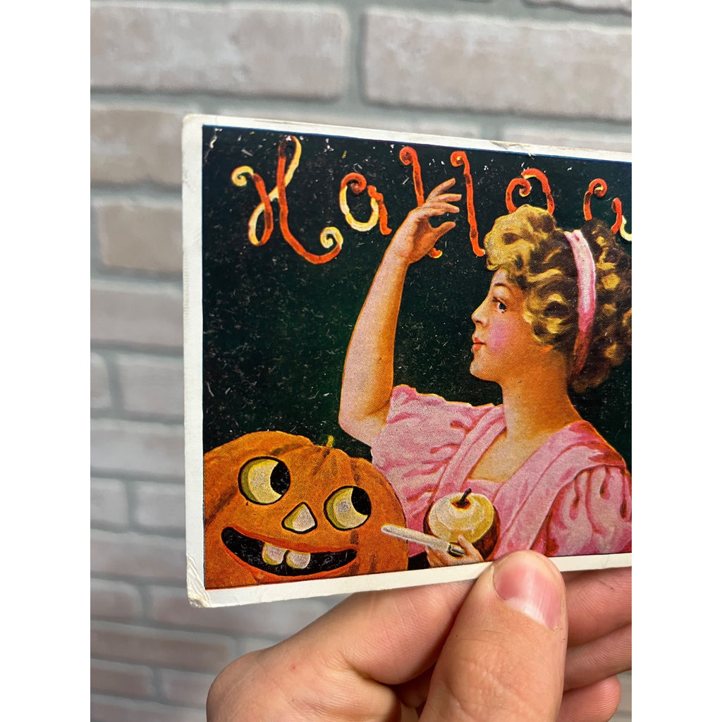 HALLOWEEN Girl Peels Apple Jack-O-Lantern International 1908 embossed Postcard
