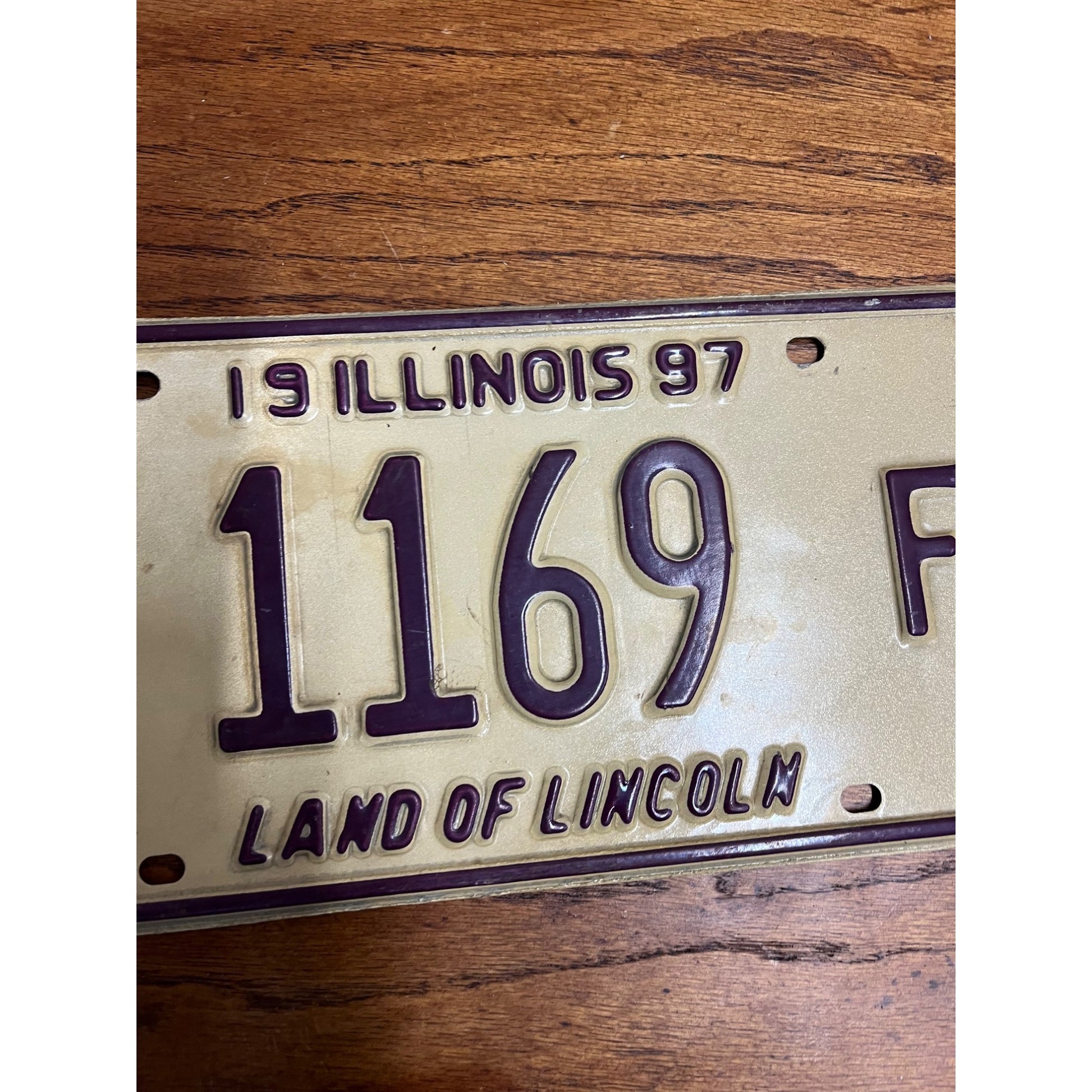 Original 1997 Illinois Dealer Dealership License Plate DL 1169 Purple Beige