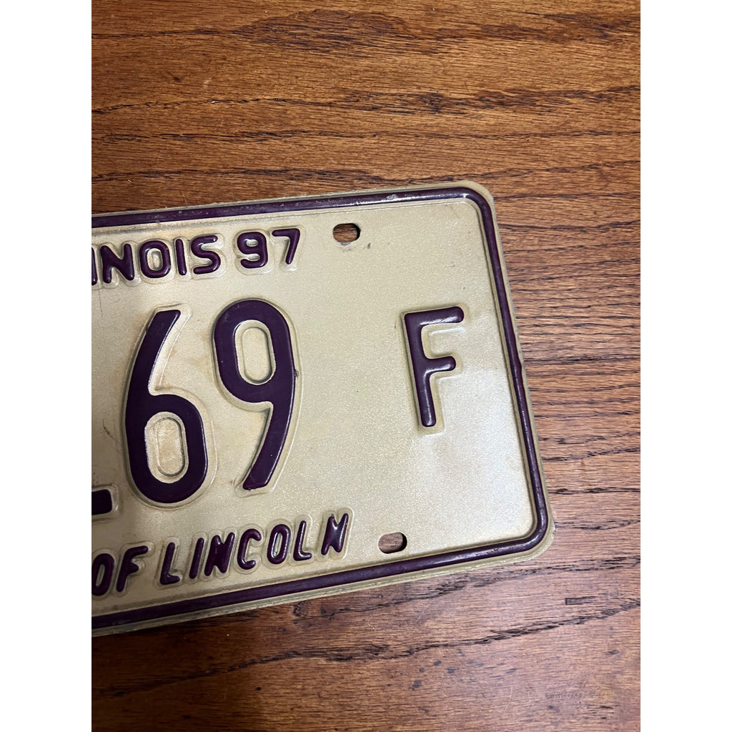 Original 1997 Illinois Dealer Dealership License Plate DL 1169 Purple Beige