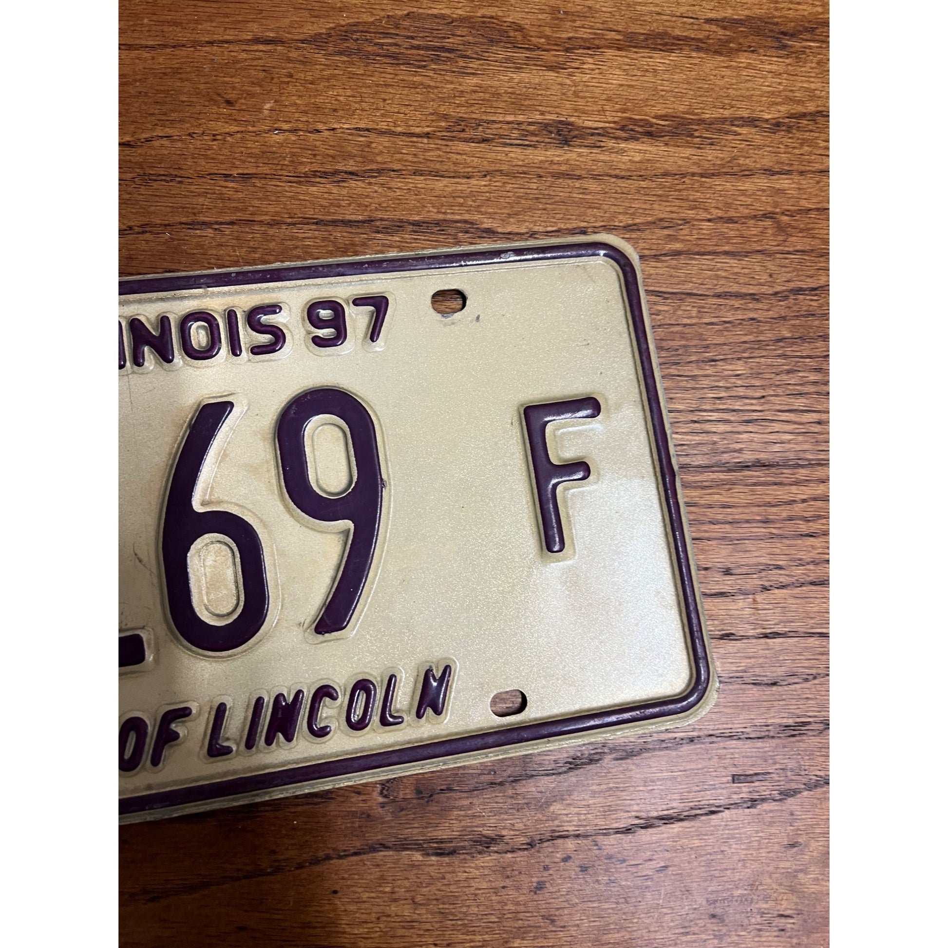 Original 1997 Illinois Dealer Dealership License Plate DL 1169 Purple Beige
