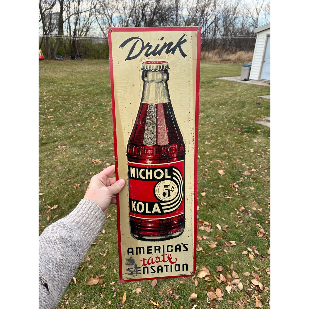 Nichol Kola Embossed Painted Metal Sign Vertical With Bottle 24x8 Inches