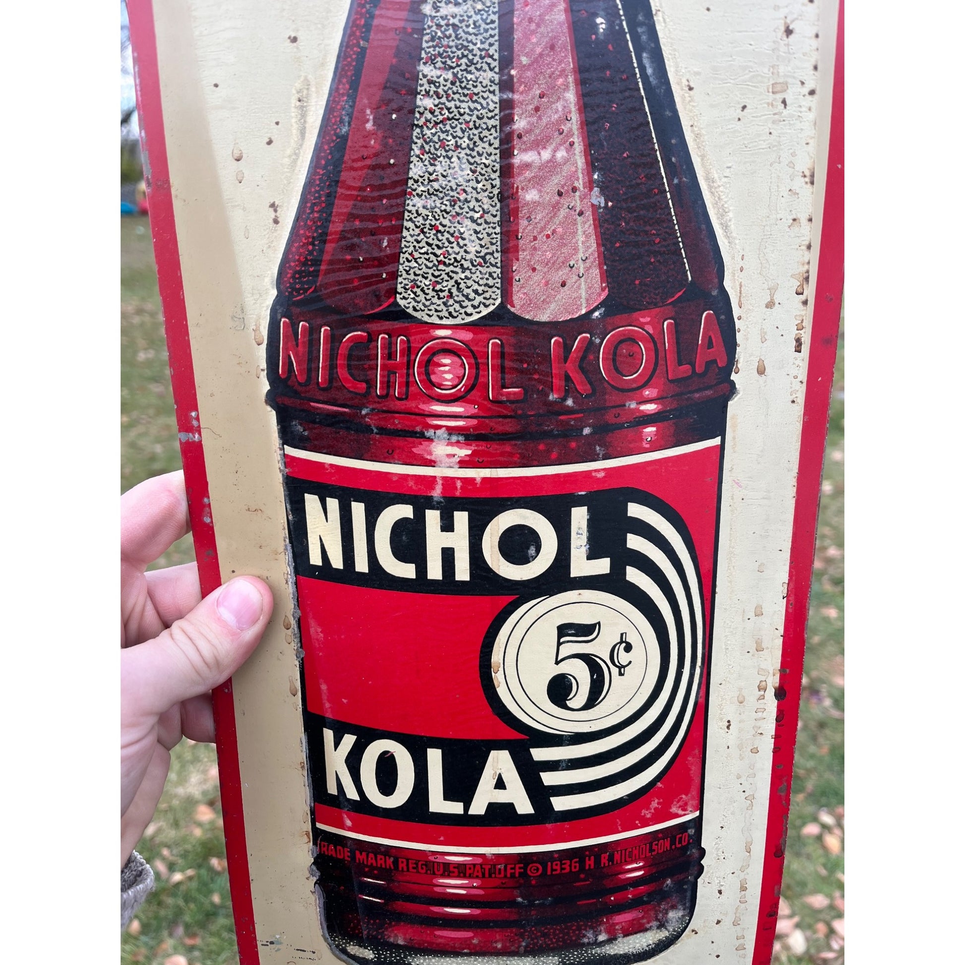 Nichol Kola Embossed Painted Metal Sign Vertical With Bottle 24x8 Inches