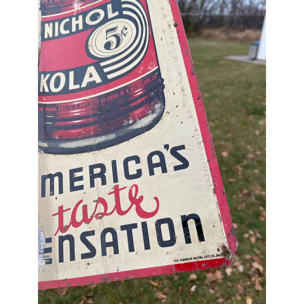 Nichol Kola Embossed Painted Metal Sign Vertical With Bottle 24x8 Inches