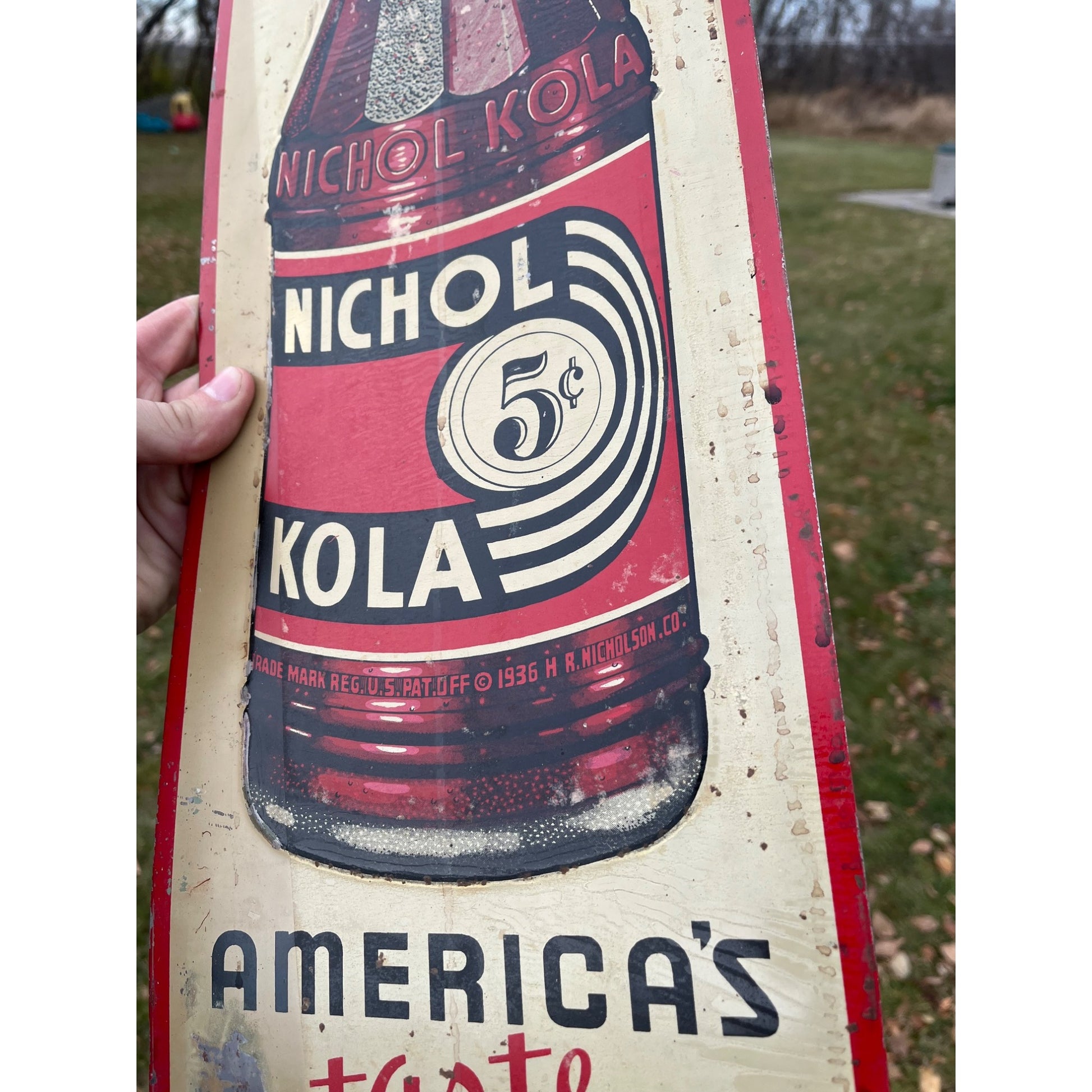 Nichol Kola Embossed Painted Metal Sign Vertical With Bottle 24x8 Inches