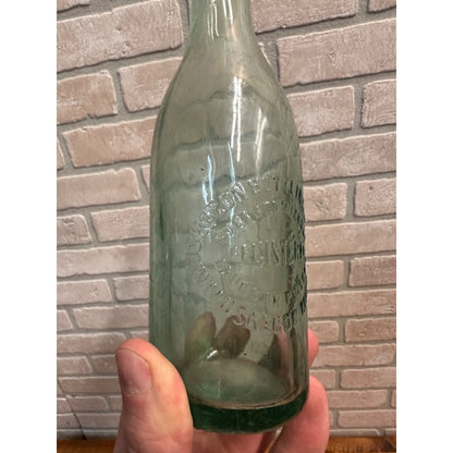 Vintage Muskegon Bottling Works Soda Bottle Aqua Blue Embossed Michigan MI