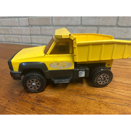 Vintage Tonka 13.5" Yellow Toy Dump Truck Pressed Steel Toy Plastic Tires