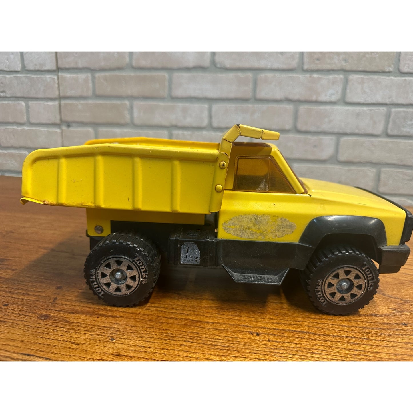 Vintage Tonka 13.5" Yellow Toy Dump Truck Pressed Steel Toy Plastic Tires