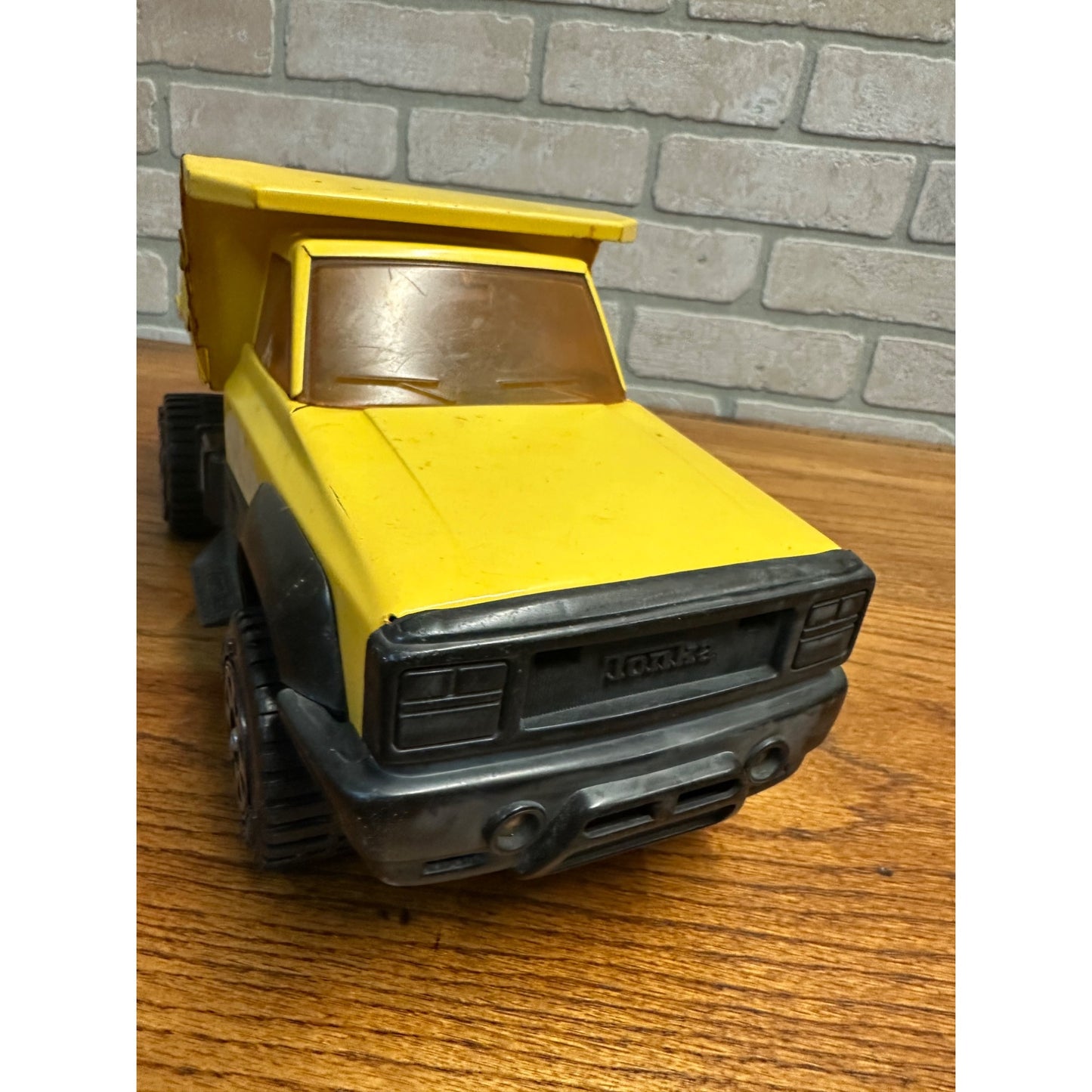 Vintage Tonka 13.5" Yellow Toy Dump Truck Pressed Steel Toy Plastic Tires