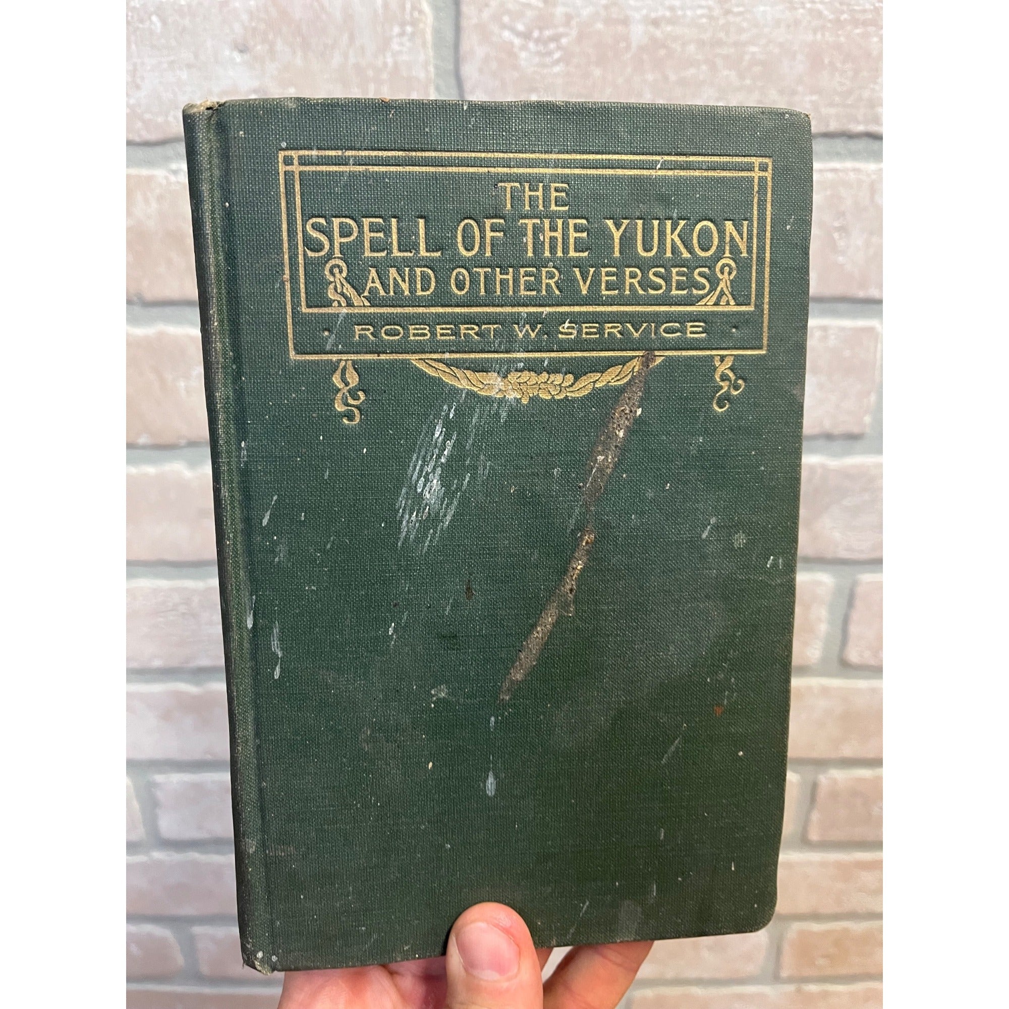 Vintage Hardcover Book The Spell of the Yukon & Other Verses By Robert W. Service Copyright 1907