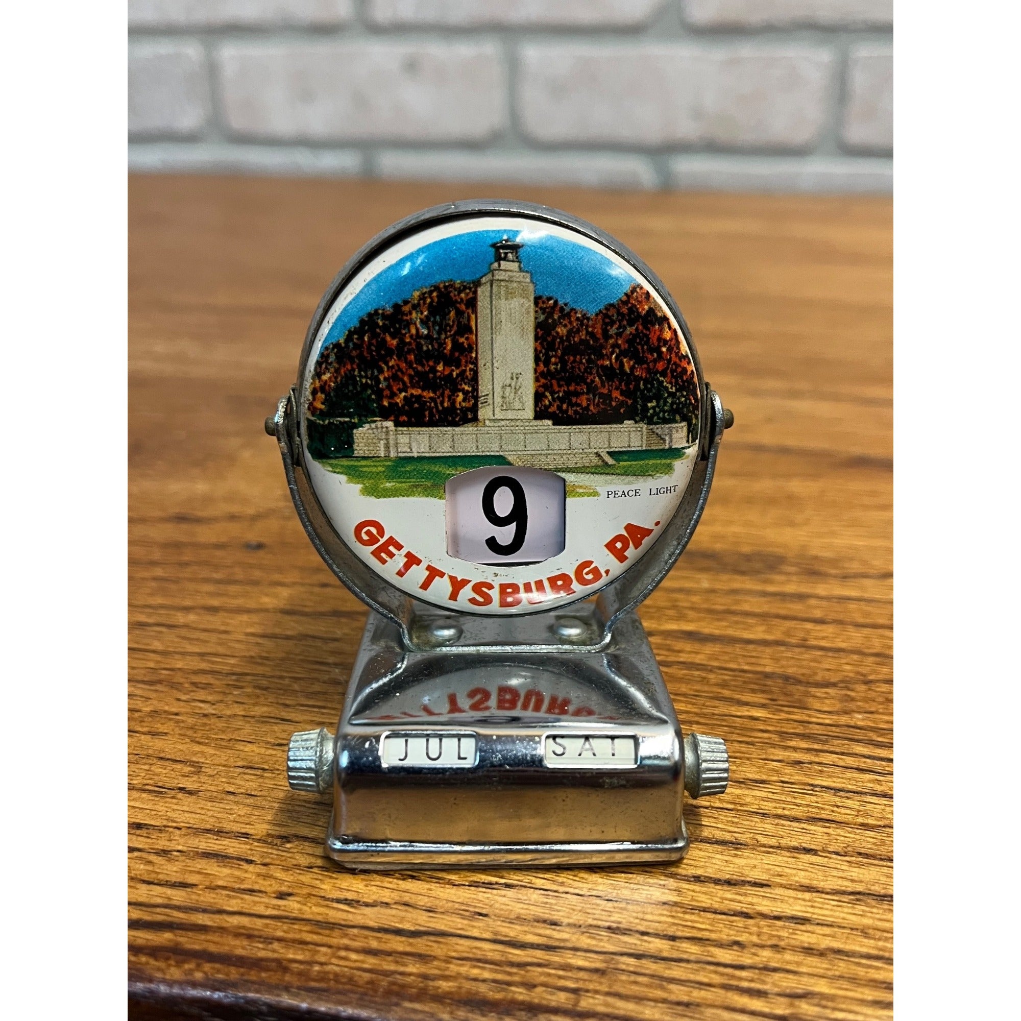 Vintage Perpetual Flip Mechanical Desktop Calendar Metal Gettysburg PA