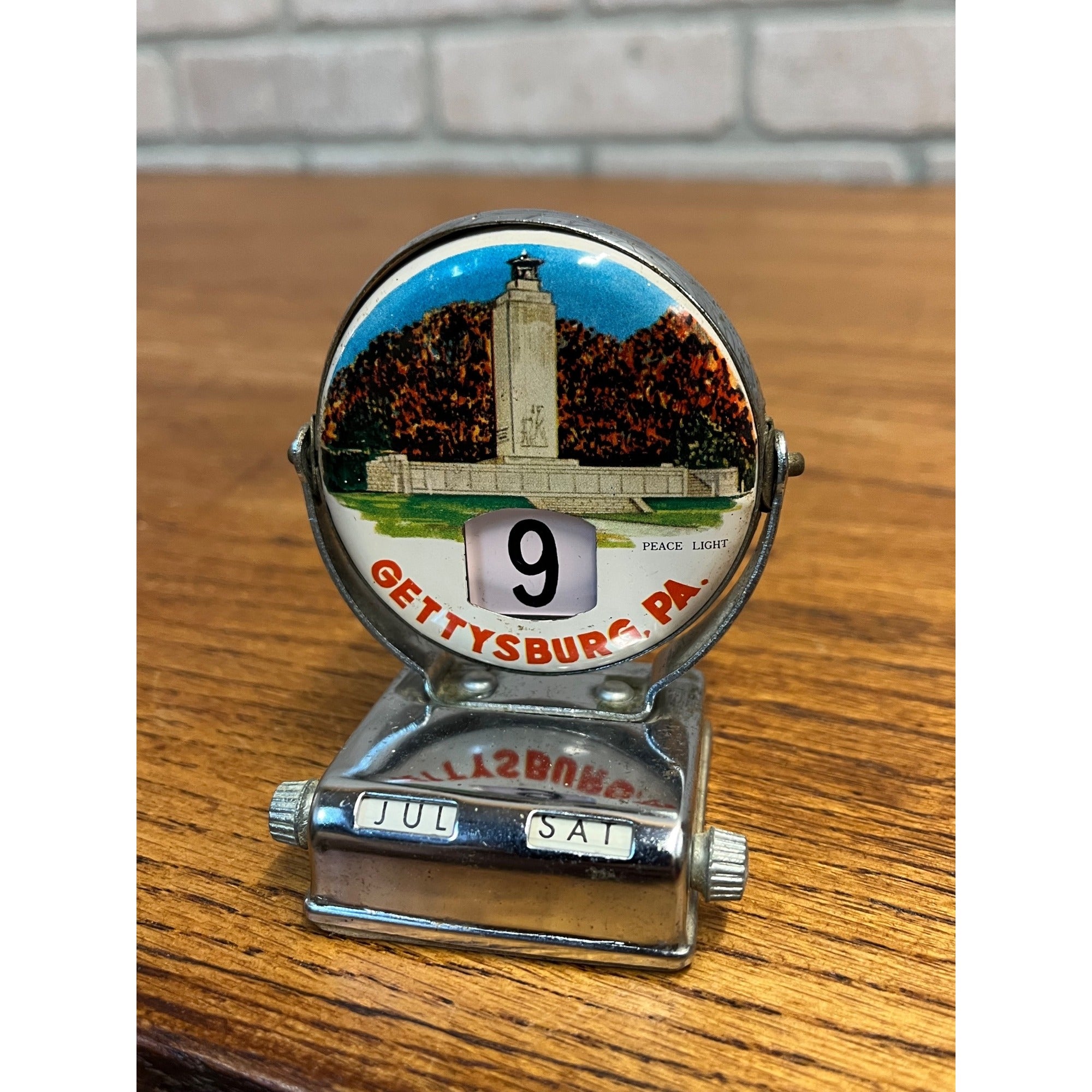 Vintage Perpetual Flip Mechanical Desktop Calendar Metal Gettysburg PA