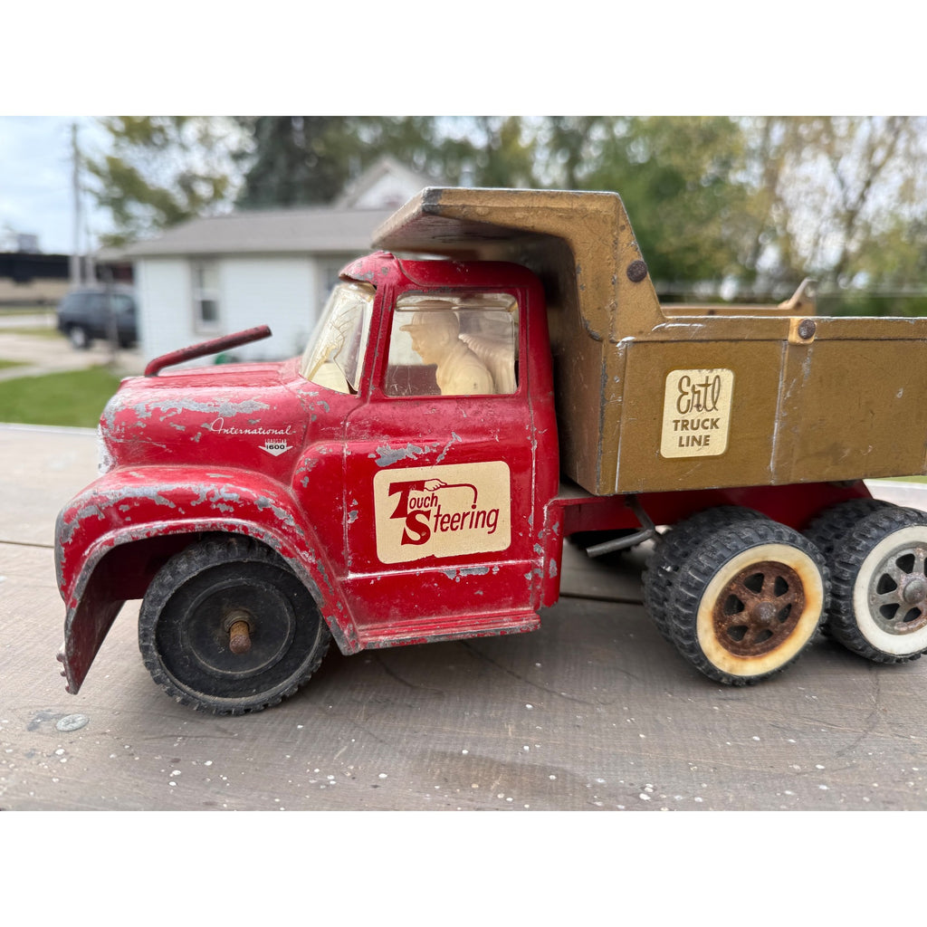 Vintage 1950s Ertl International Touch Steering IH Dump Truck Metal Toy