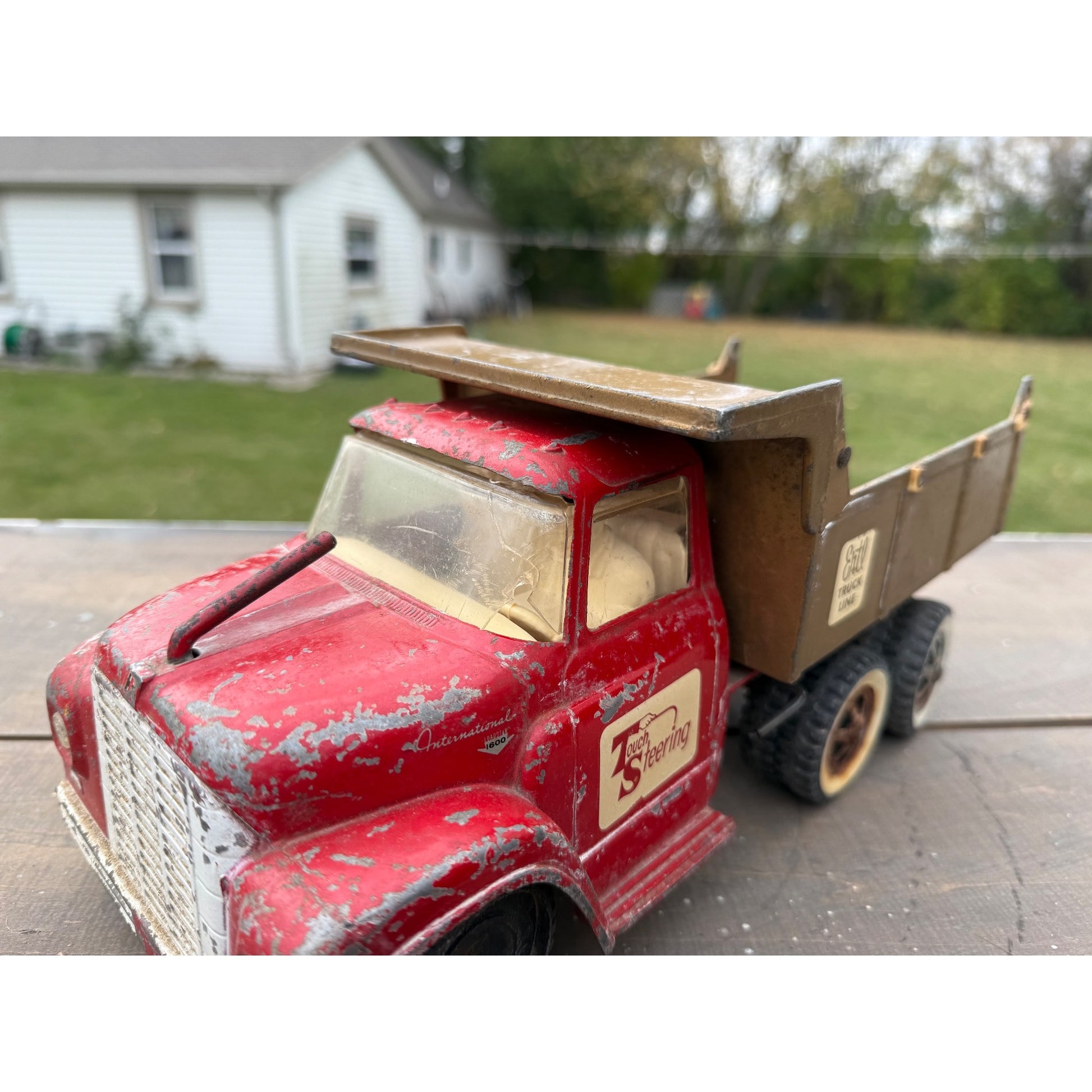 Vintage 1950s Ertl International Touch Steering IH Dump Truck Metal Toy