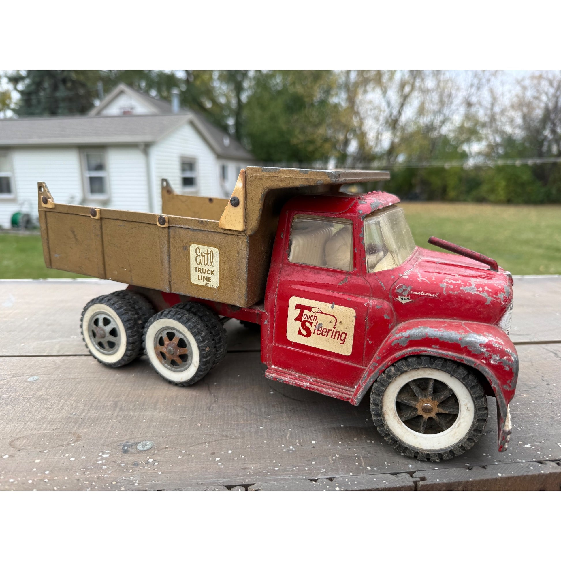 Vintage 1950s Ertl International Touch Steering IH Dump Truck Metal Toy