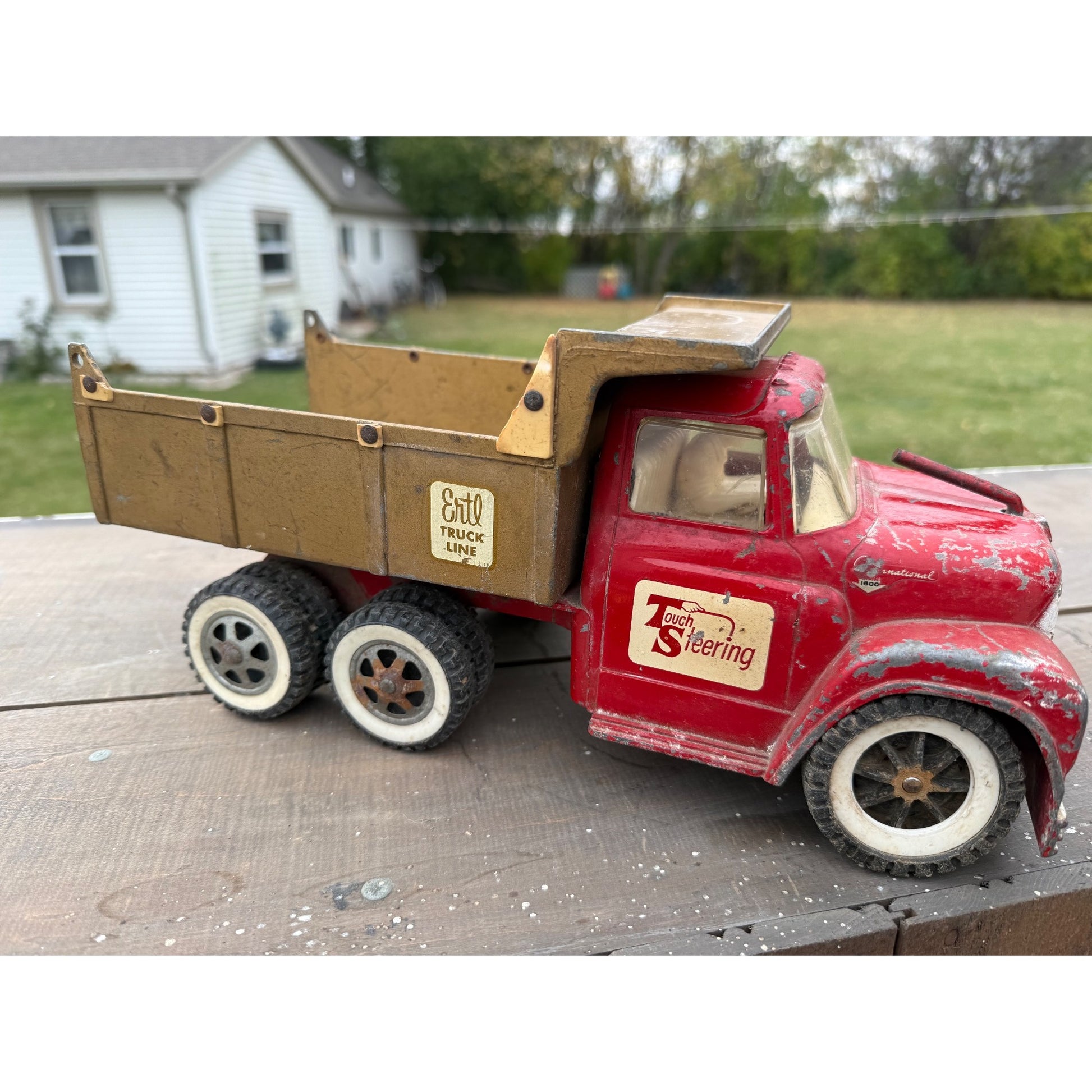 Vintage 1950s Ertl International Touch Steering IH Dump Truck Metal Toy
