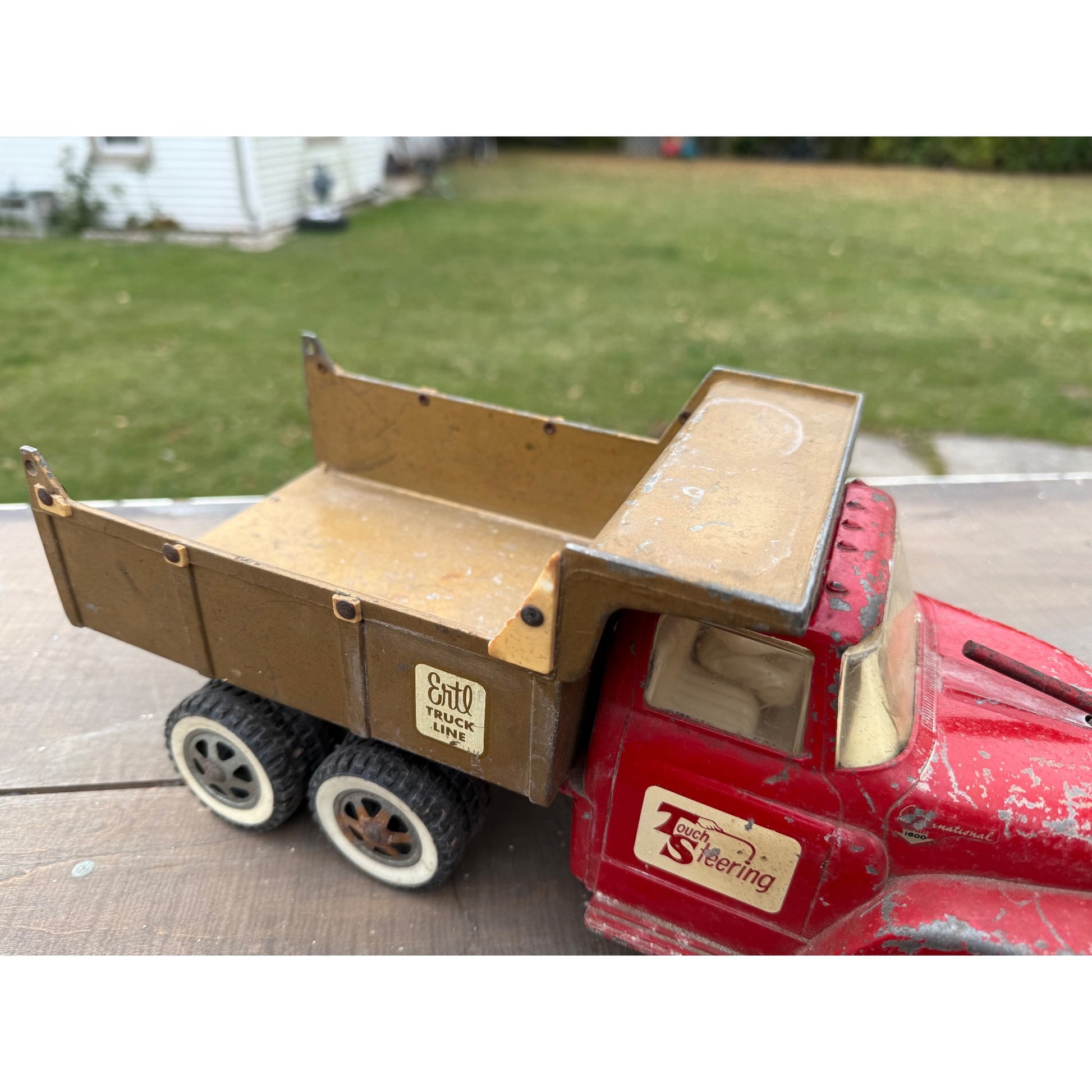 Vintage 1950s Ertl International Touch Steering IH Dump Truck Metal Toy