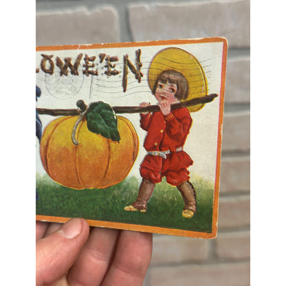 Vintage 1908 Embossed Halloween Postcard Children Carrying Pumpkin Intl Art Pub