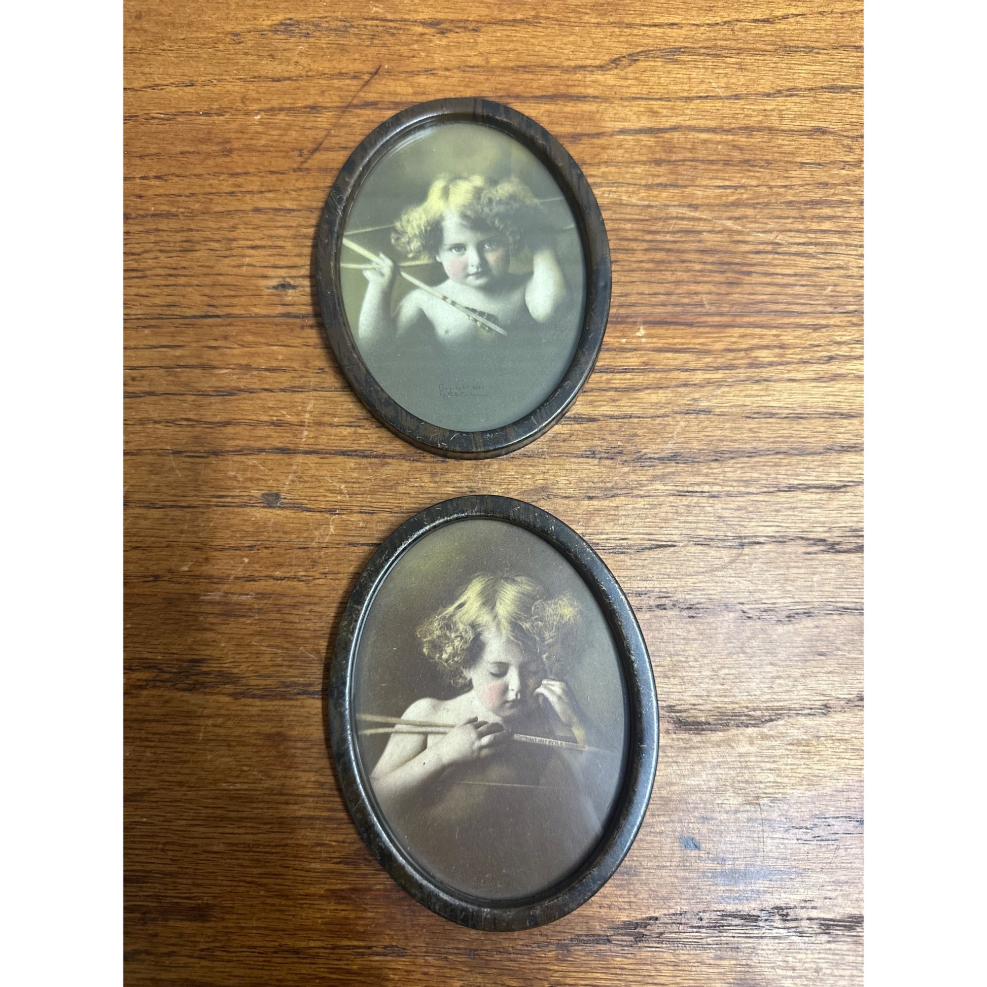 PAIR Vintage Tin Oval Picture Frame Cupid Awake Asleep 1897 Parkinson