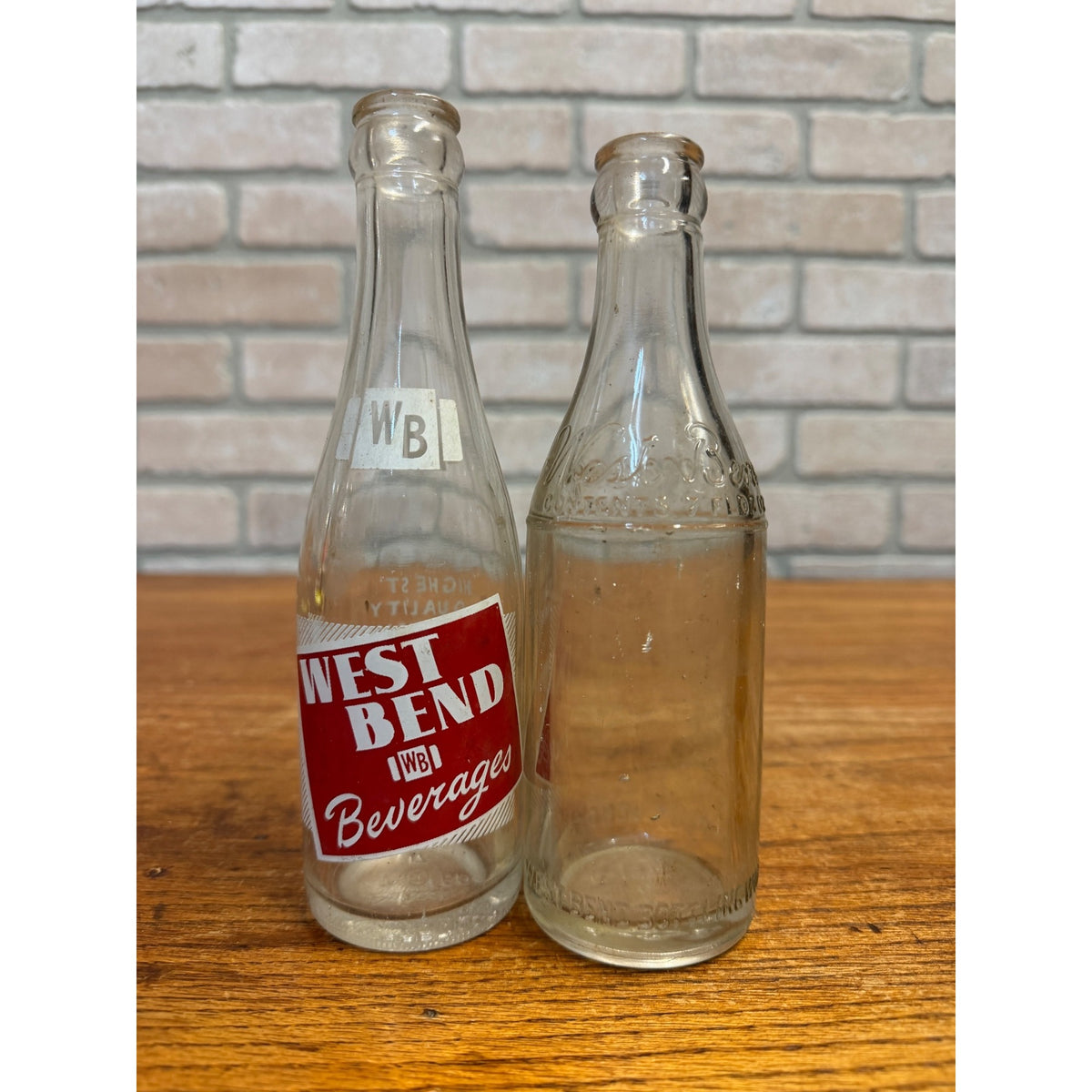 Vintage Lot of 2 West Bend Beverages Wisconsin Soda Bottles ACl & Embossed