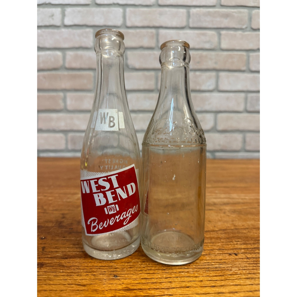 Vintage Lot of 2 West Bend Beverages Wisconsin Soda Bottles ACl & Embossed