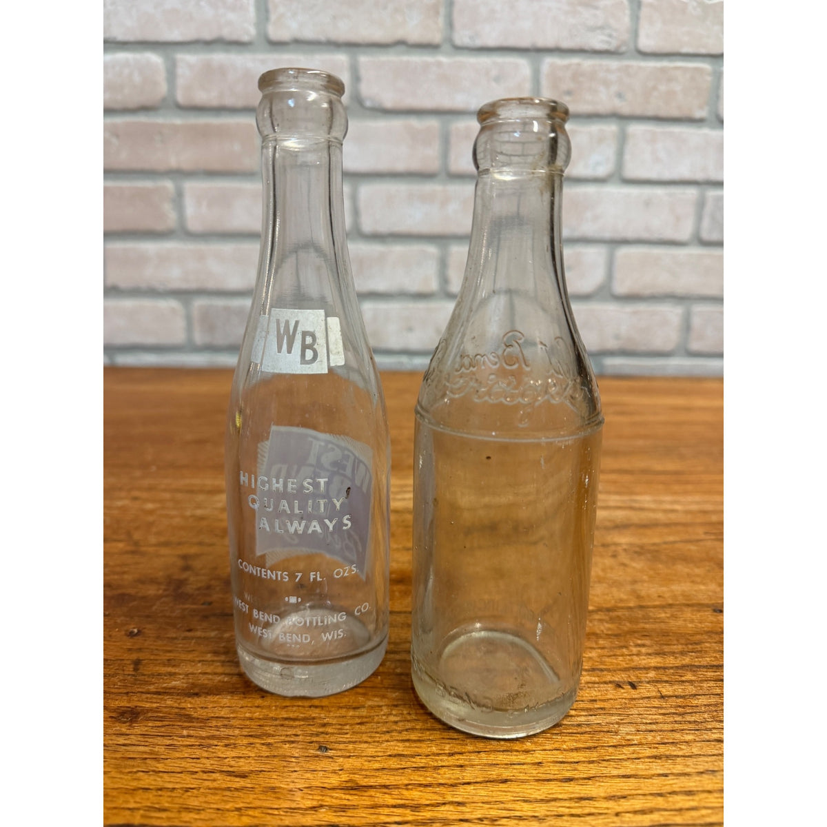 Vintage Lot of 2 West Bend Beverages Wisconsin Soda Bottles ACl & Embossed