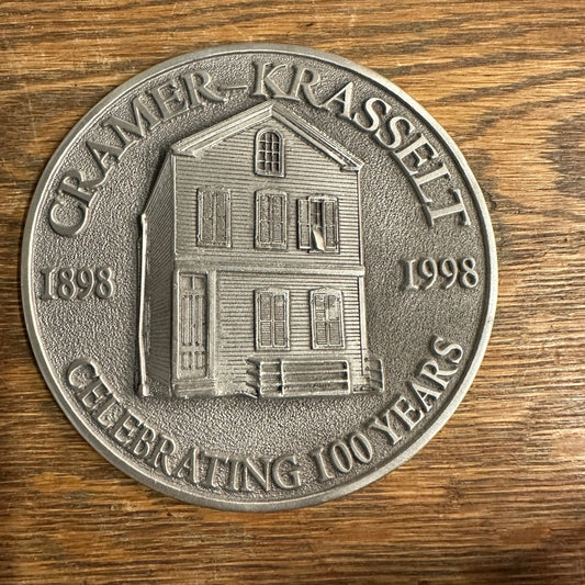 Cramer - Krasselt (1898-1998) 100 Years Metal Medallion Paperweight Advertising