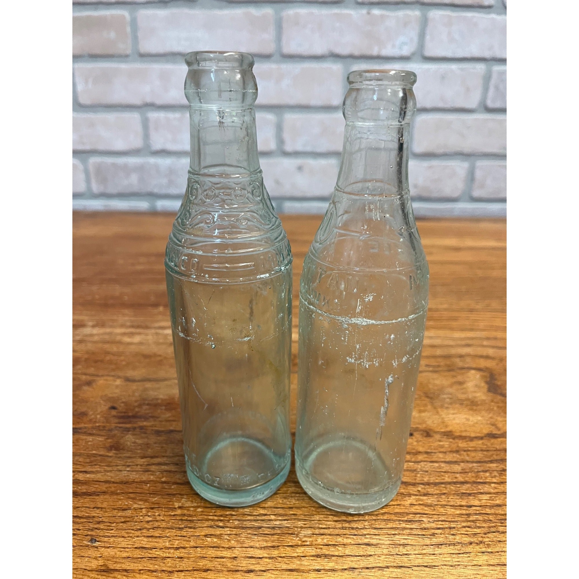 (2) Milwaukee Soda Bottles Manhattan & EL Husting 7oz Wisconsin