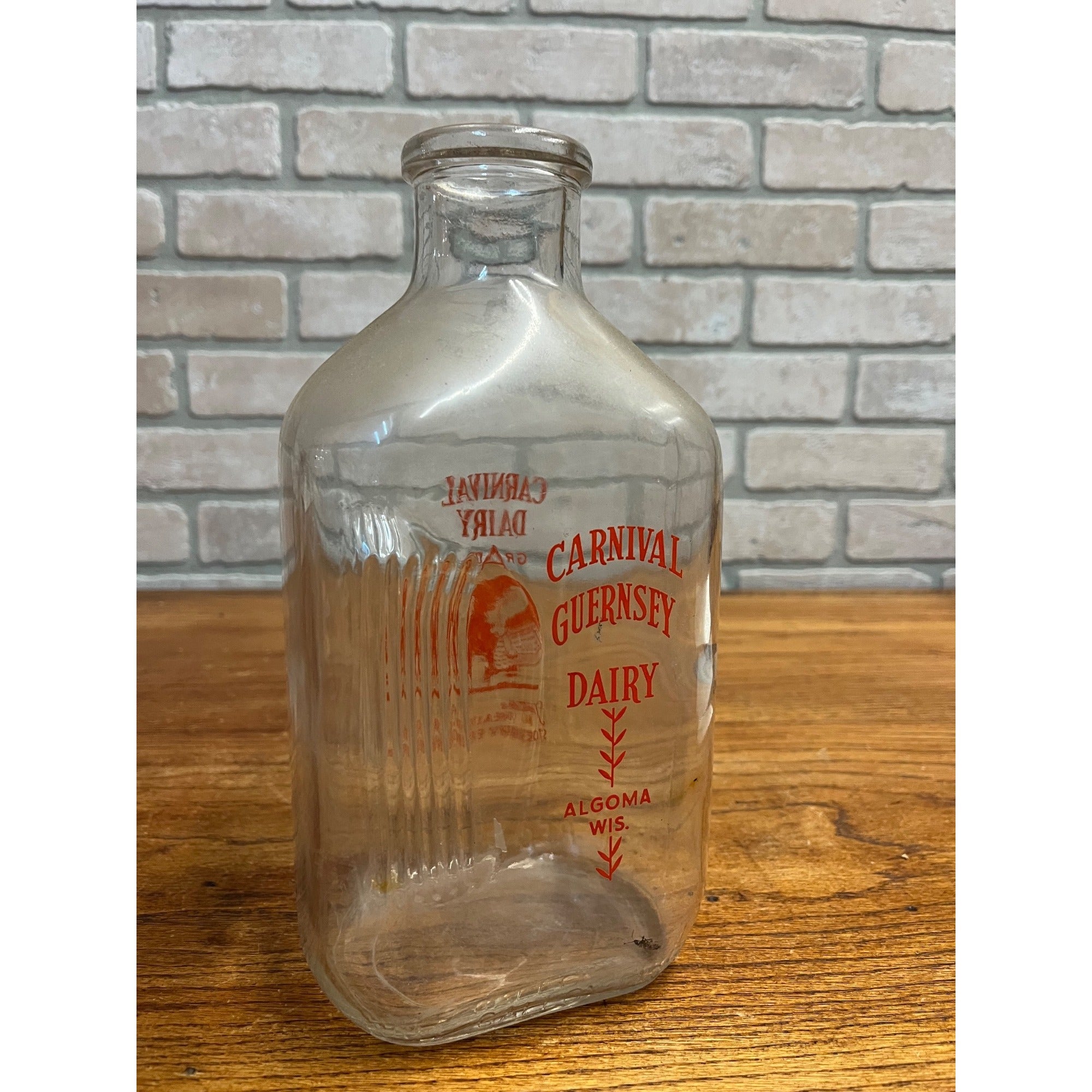 Carnival Guernsey Dairy  Quart Store Milk Bottle - Algoma, Wis Wi