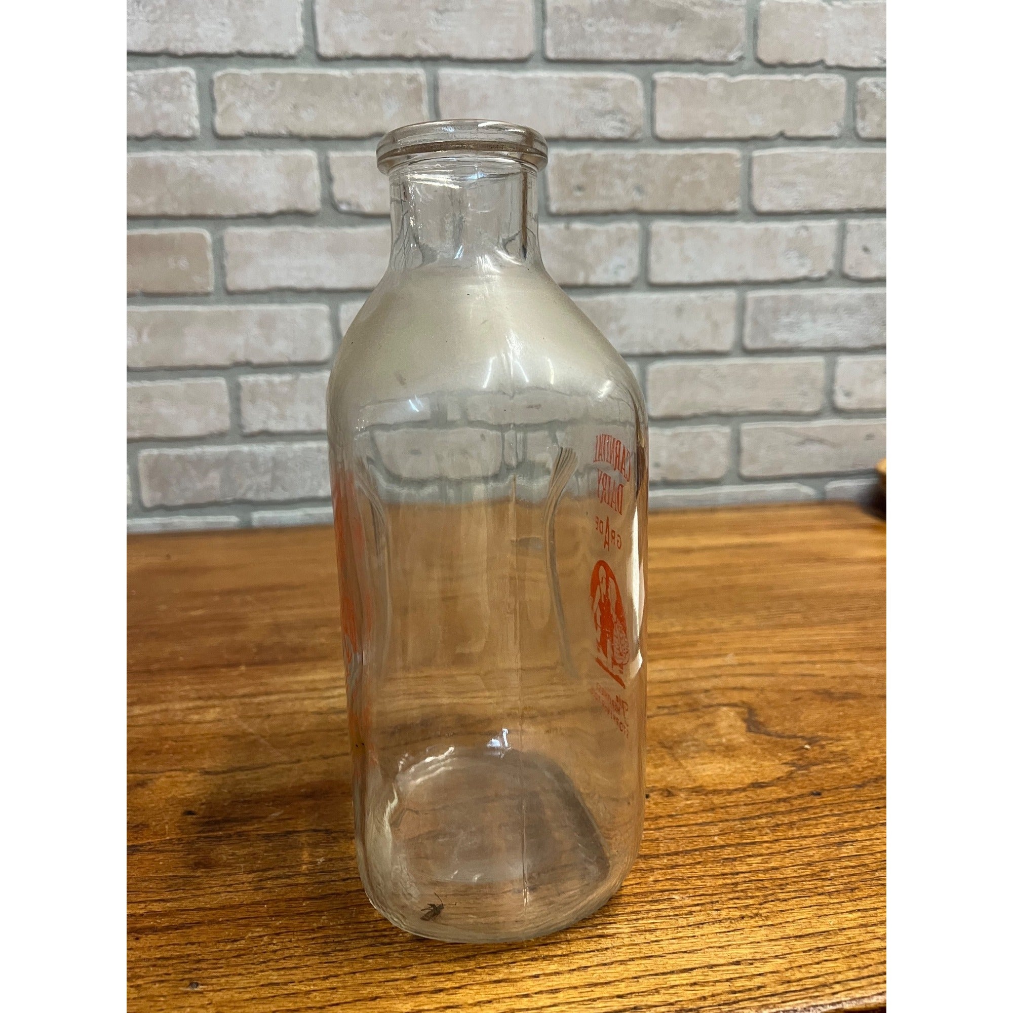 Carnival Guernsey Dairy  Quart Store Milk Bottle - Algoma, Wis Wi