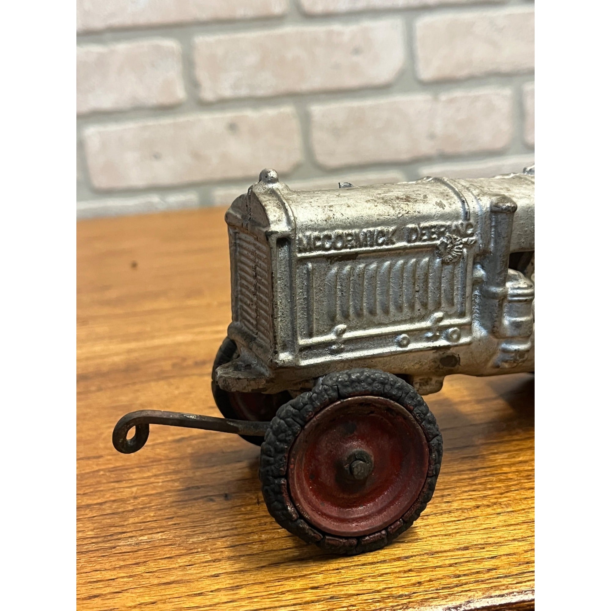 Vintage Arcade McCormick Deering Cast Iron Toy Tractor with Driver