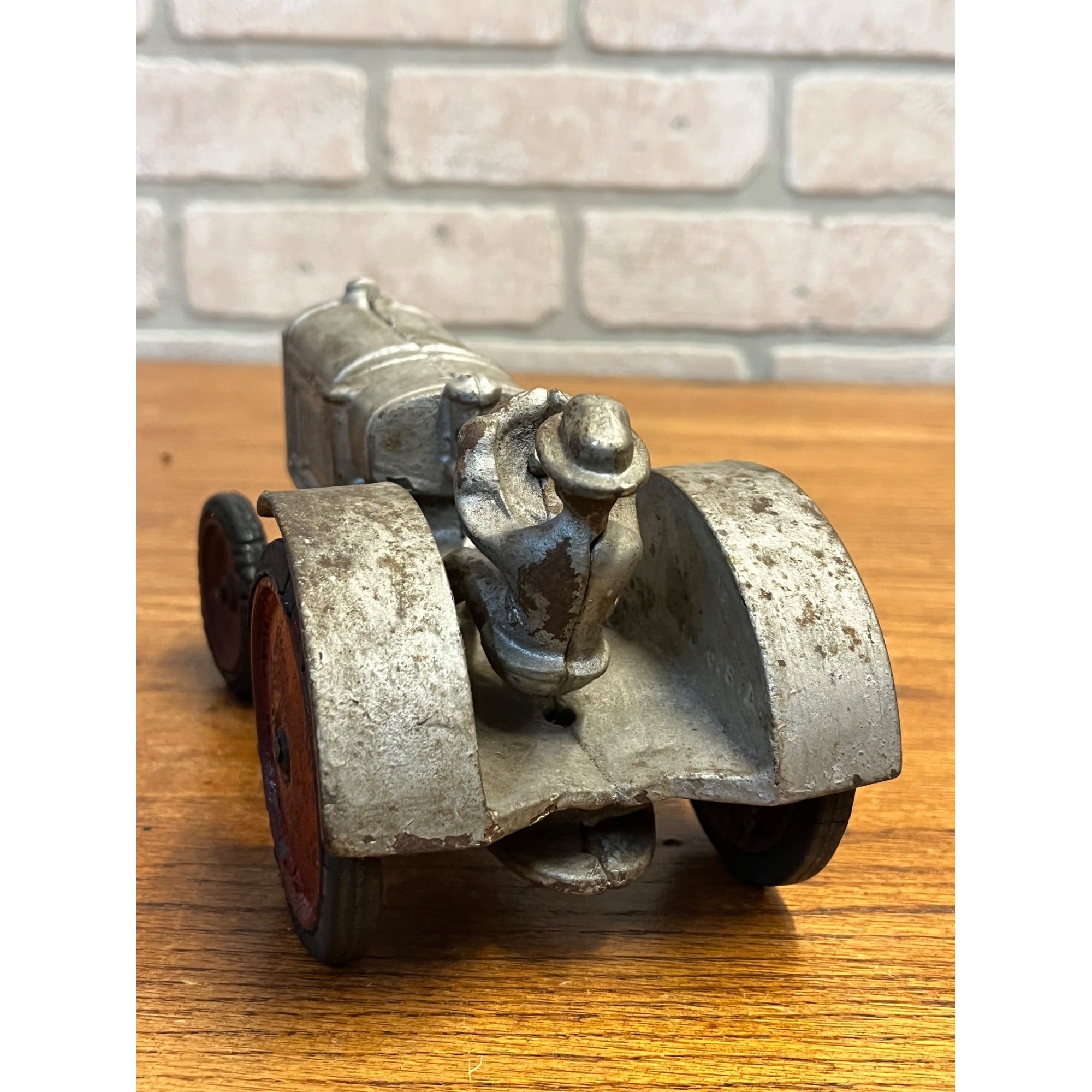 Vintage Arcade McCormick Deering Cast Iron Toy Tractor with Driver