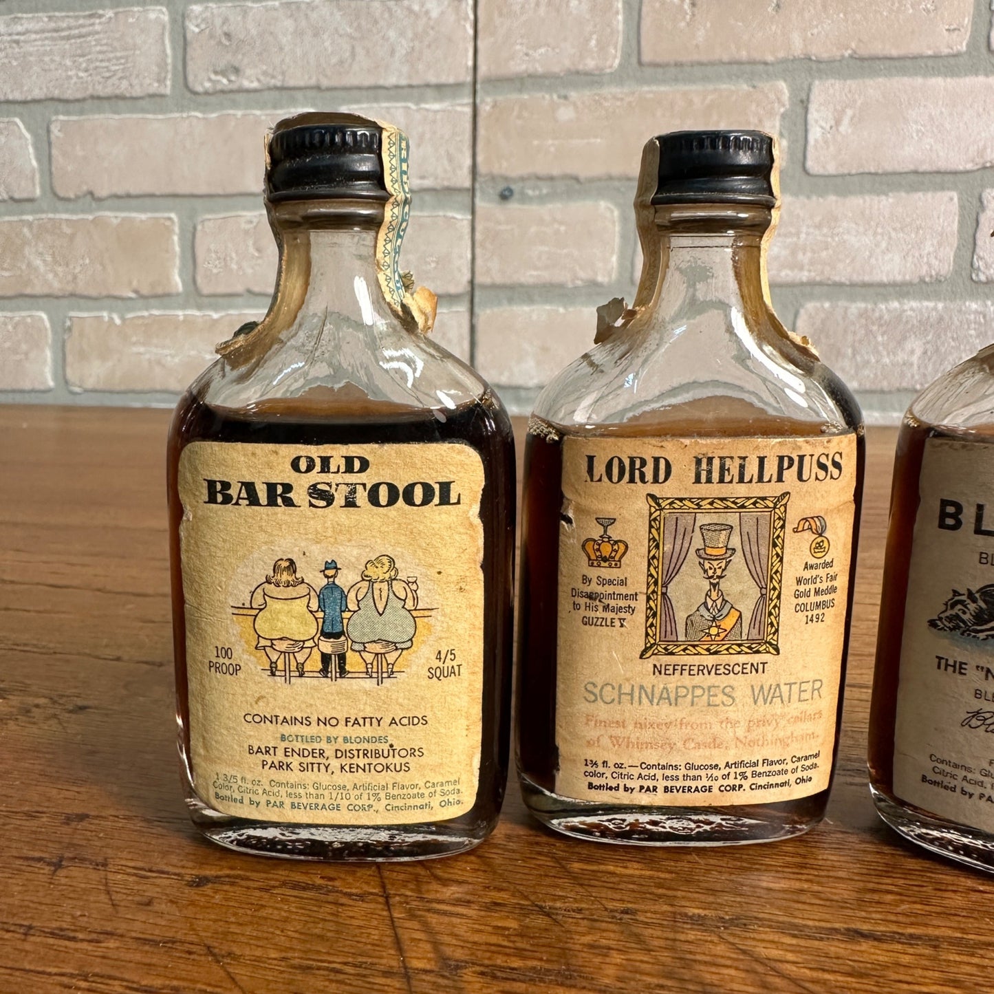 (4) Novelty Whiskey Bottles Kwyatt Urp Blot & Wipe Lord Helpuss Old Barstool