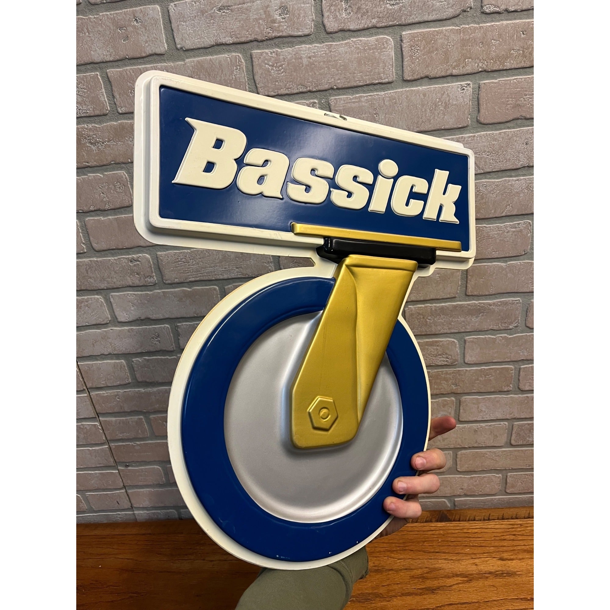 Vintage Bassick Caster Wheels Advertising Plastic Hanging Hardware Store Sign