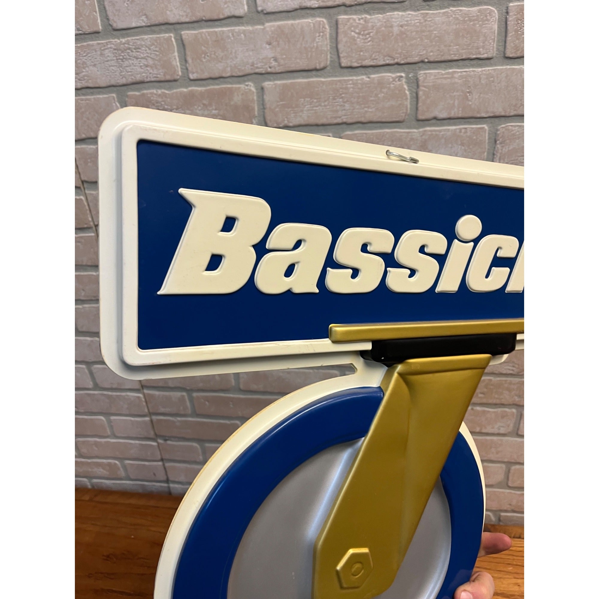 Vintage Bassick Caster Wheels Advertising Plastic Hanging Hardware Store Sign