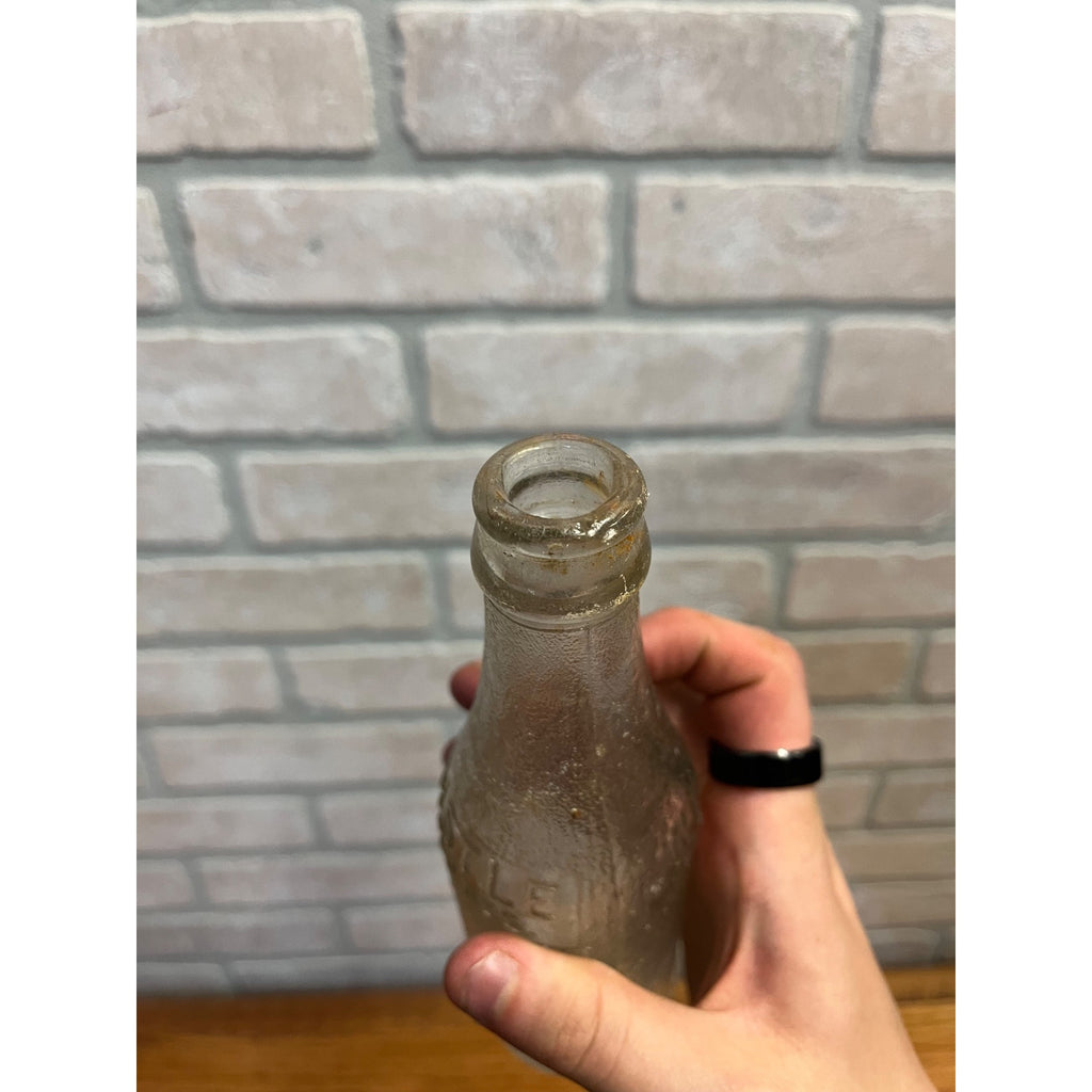 Vintage 6-1/2 oz Embossed Whistle Soda Bottle Beloit Wis