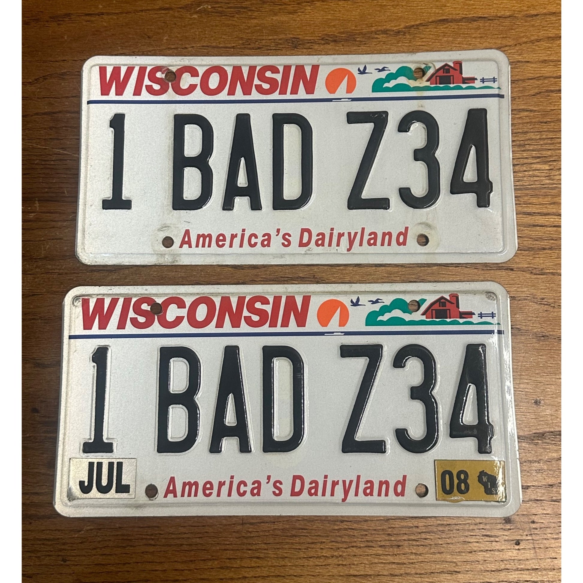 Wisconsin Dairyland Vanity License Plate Pair - 1 BAD Z34 - Chevy Lumina Exp. 08