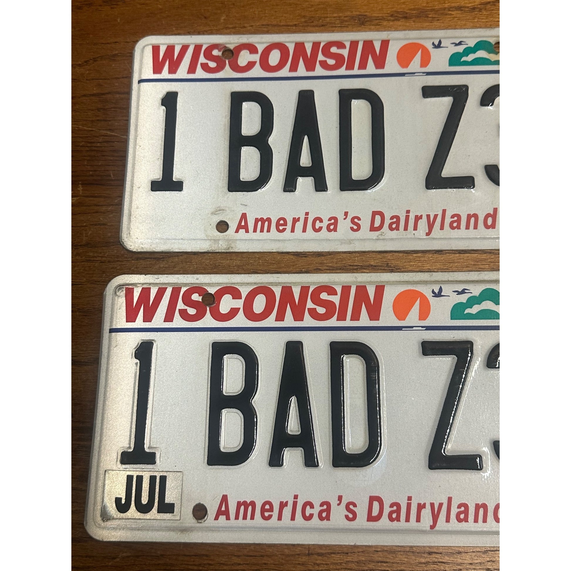 Wisconsin Dairyland Vanity License Plate Pair - 1 BAD Z34 - Chevy Lumina Exp. 08