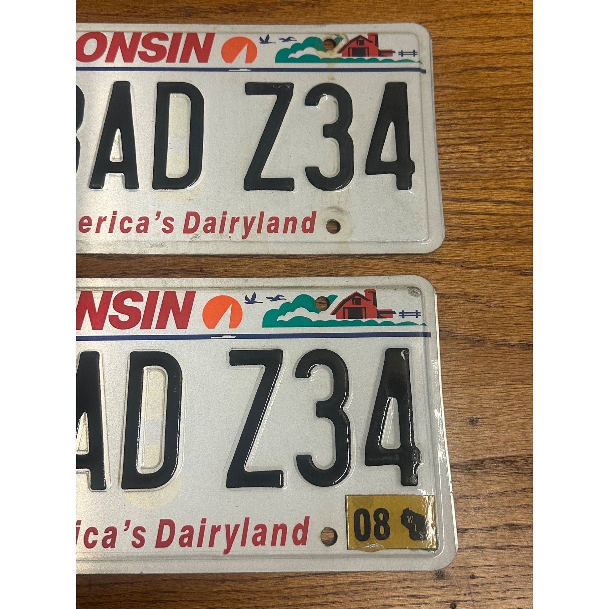 Wisconsin Dairyland Vanity License Plate Pair - 1 BAD Z34 - Chevy Lumina Exp. 08