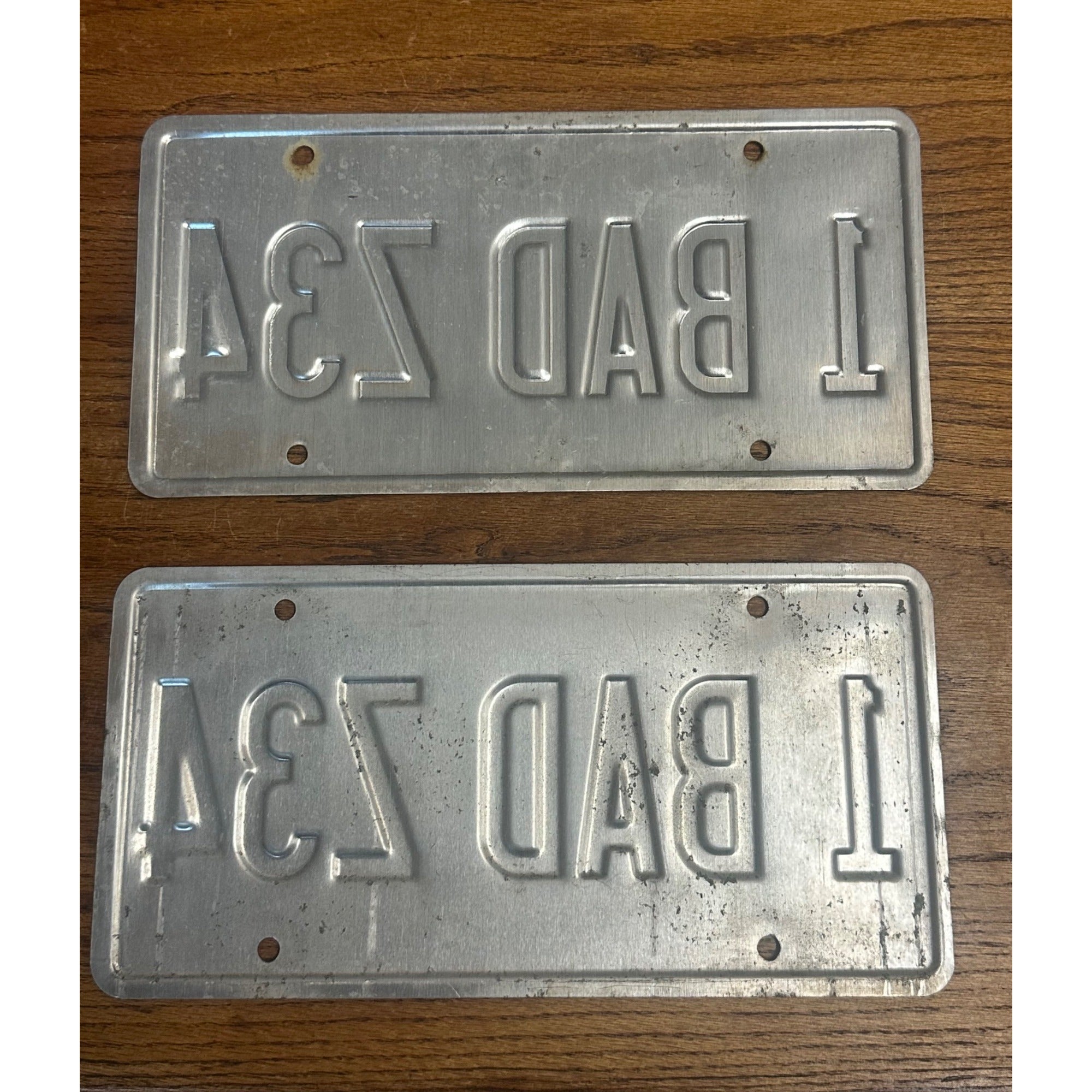 Wisconsin Dairyland Vanity License Plate Pair - 1 BAD Z34 - Chevy Lumina Exp. 08