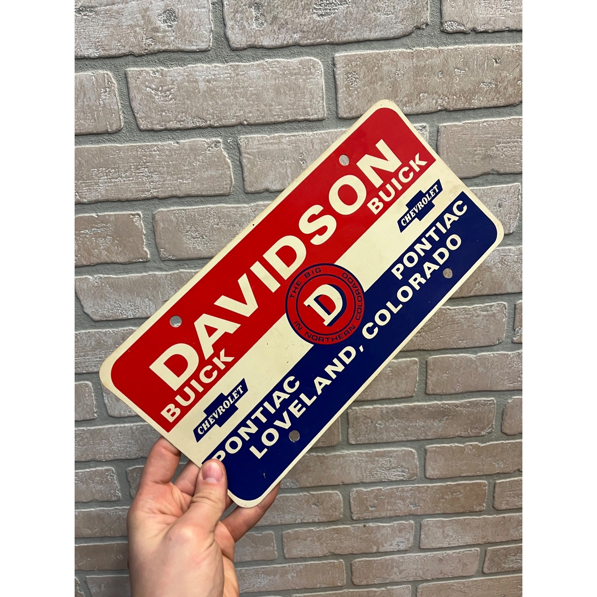 Vintage Davidson Buick Chevy Pontiac Dealer Booser Plastic License Plate Loveland CO
