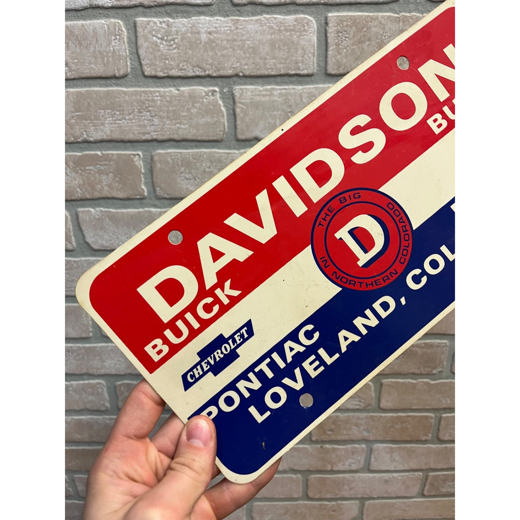 Vintage Davidson Buick Chevy Pontiac Dealer Booser Plastic License Plate Loveland CO