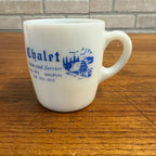 Vintage Waupun Wis Chalet Advertising Milk Glass Mug Coffee Cup