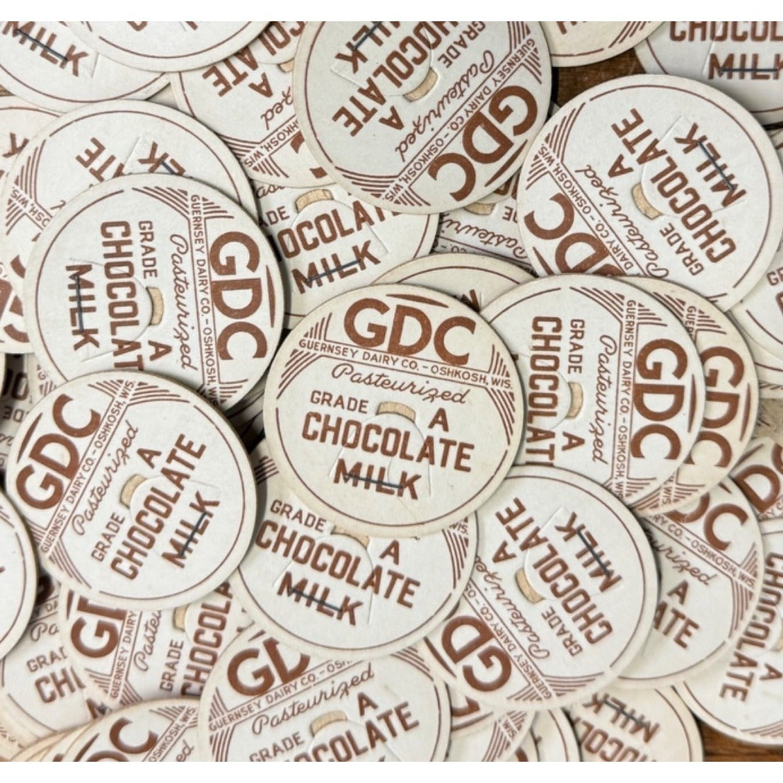Milk Bottle Cap - Guernsey Dairy Co GDC - Oshkosh, (Wisconsin) Wis WI - Chocolate