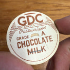 Milk Bottle Cap - Guernsey Dairy Co GDC - Oshkosh, (Wisconsin) Wis WI - Chocolate