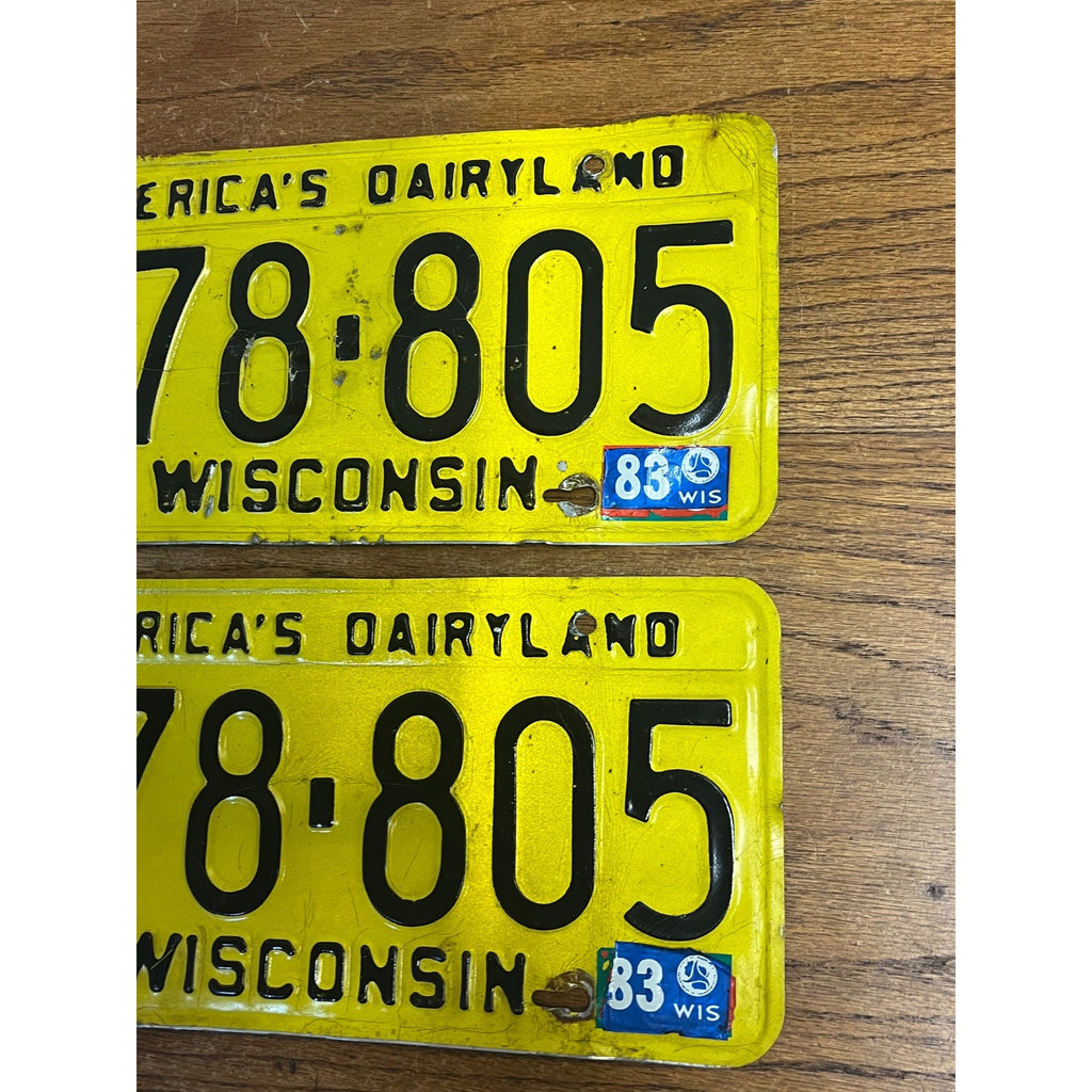 Vintage 1983 Wisconsin Yellow Black Embossed Metal License Plates Dairyland Pair