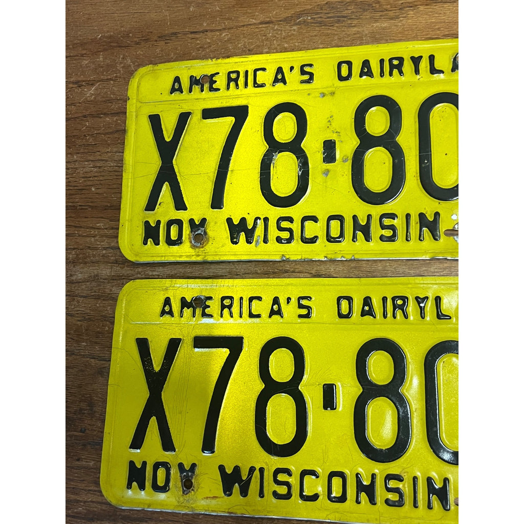 Vintage 1983 Wisconsin Yellow Black Embossed Metal License Plates Dairyland Pair