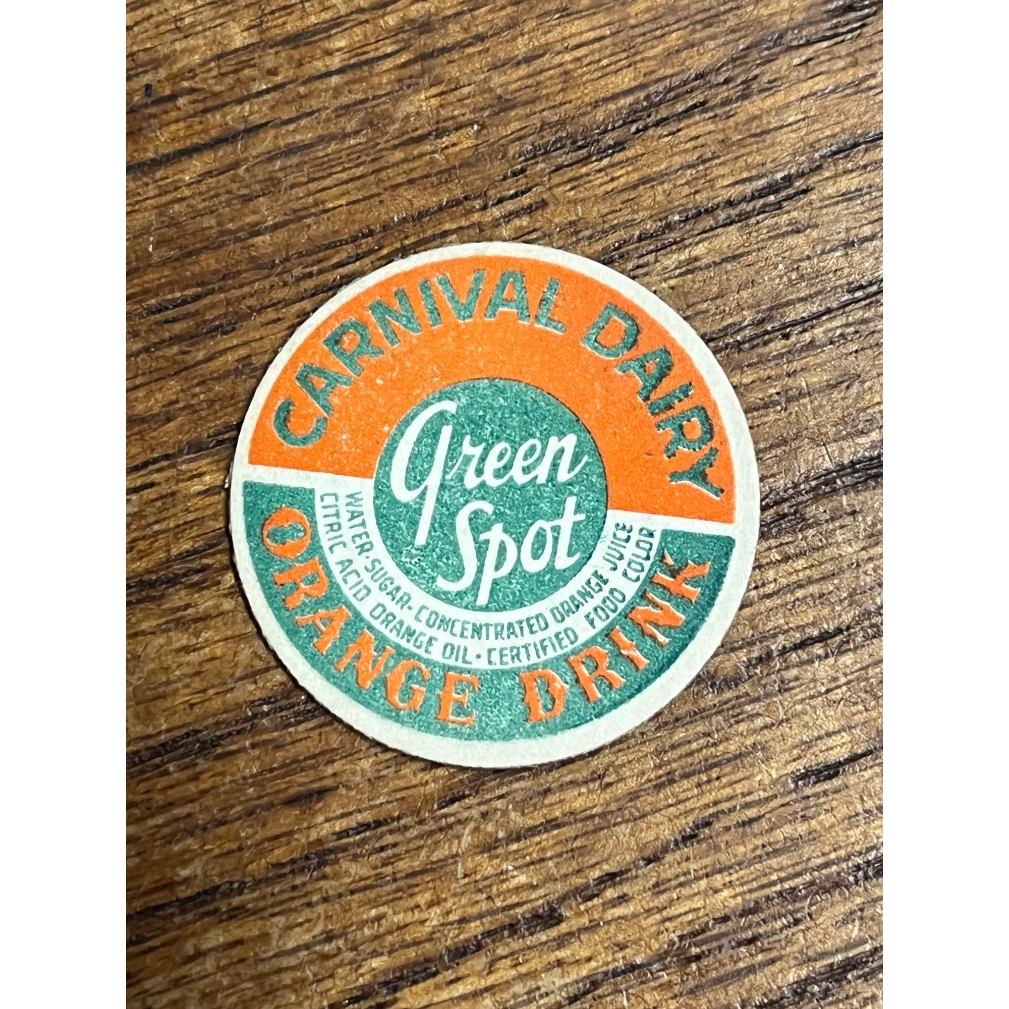 Milk Bottle Cap - Carnival Dairy / Algoma WI / Wisconsin / Orange Drink / Green Spot
