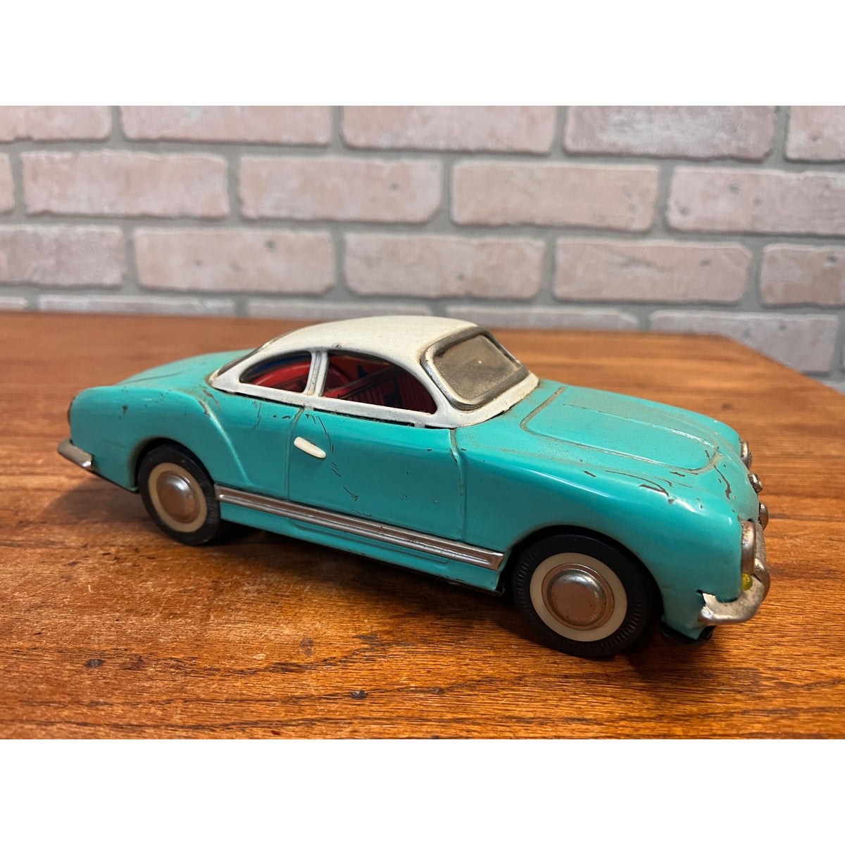 Vintage 1950s Volkswagen Karmann Ghia MF-743 Tin Friction Toy Car Sedan Aqua