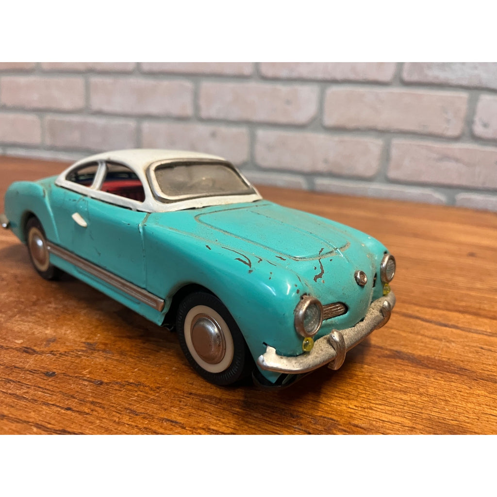 Vintage 1950s Volkswagen Karmann Ghia MF-743 Tin Friction Toy Car Sedan Aqua